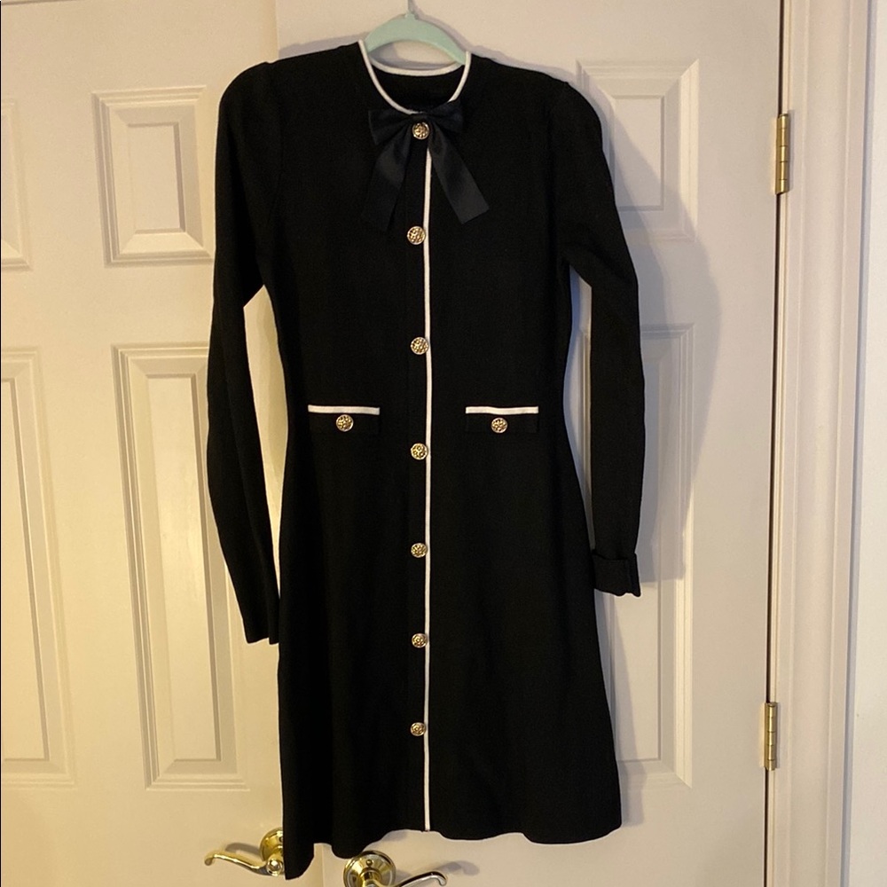Elegant Black Dress with Gold buttons.